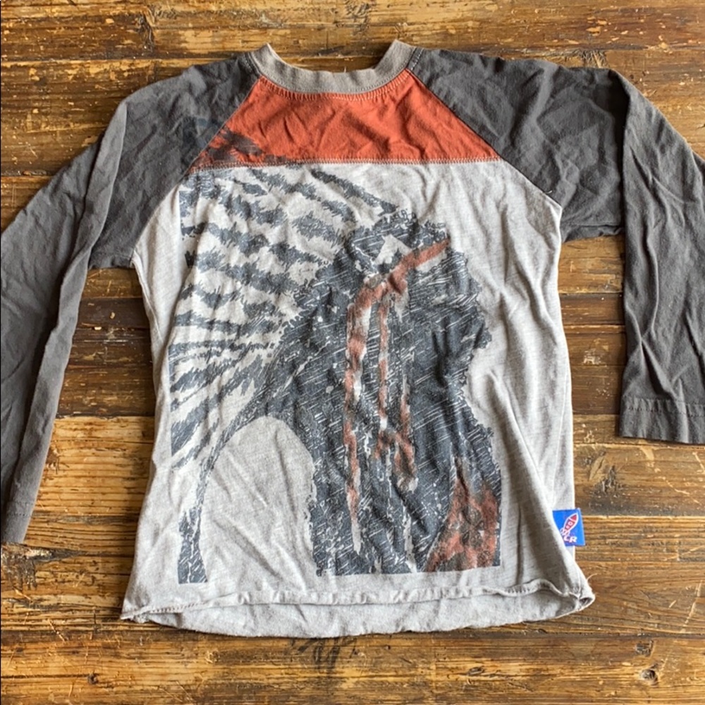 Charlie rocket raglan with chief head design.